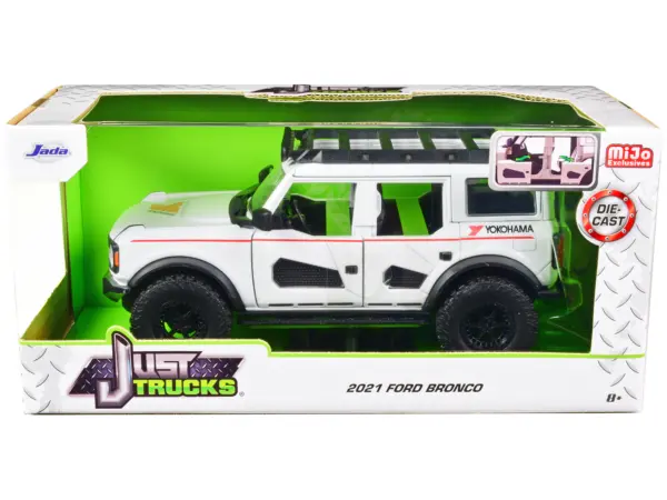 2021 Ford Bronco White with Red Stripes and Roof Rack "Yokohama Tires" "Just Trucks" Series 1/24 Diecast Model Car by Jada #1