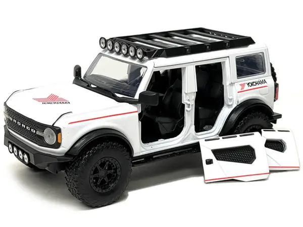 2021 Ford Bronco White with Red Stripes and Roof Rack "Yokohama Tires" "Just Trucks" Series 1/24 Diecast Model Car by Jada #2
