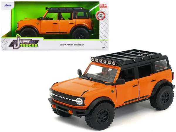 2021 Ford Bronco Orange with Black Stripes and Roof Rack "Just Trucks" Series 1/24 Diecast Model Car by Jada #1
