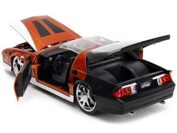 1985 Chevrolet Camaro Z/28 Orange Metallic with Graphics and Chester Cheetah Diecast Figure "Cheetos" "Hollywood Rides" Series 1/24 Diecast Model Car by Jada #4