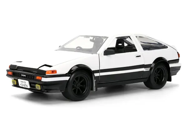 Toyota Trueno (AE86) RHD (Right Hand Drive) White and Black with Graphics and Takumi Diecast Figure "Initial D" (1998-2021) TV Series "Anime Hollywood Rides" Series 1/24 Diecast Model by Jada #2