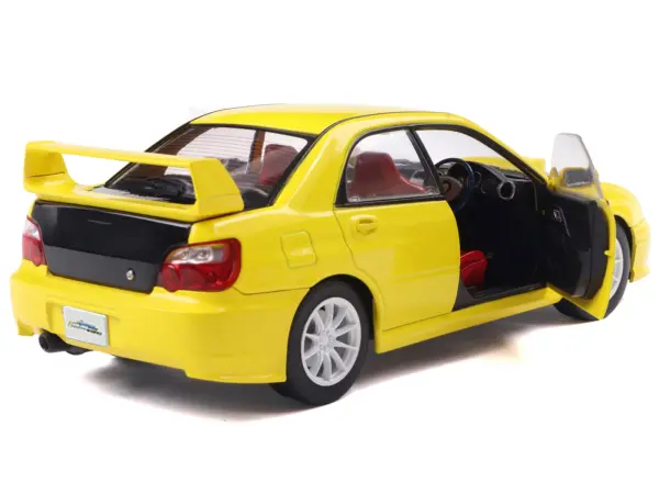2003 Subaru Impreza WRX STI RHD (Right Hand Drive) Yellow with Carbon Hood 1/18 Diecast Model Car by Solido #4