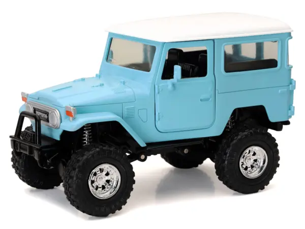 Toyota Land Cruiser FJ40 Light Blue with White Top "Xtreme Off-Road" Series 1/24 Diecast Model by New Ray #2