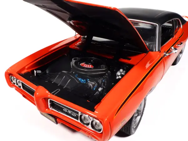 1969 Pontiac GTO Judge Carousel Red with Black Stripes and Black Vinyl Top "Mecum Auctions" "American Muscle" Series 1/18 Diecast Model Car by Auto World #3