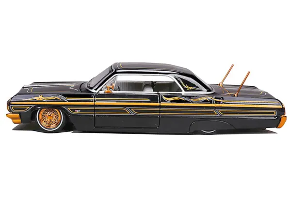 1964 Chevrolet Impala SS Lowrider Black Metallic with Gold Graphics and Gray Interior "Lowriders" "Maisto Design" Series 1/26 Diecast Model Car by Maisto #2