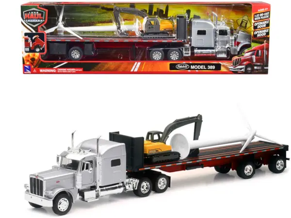 Peterbilt 389 Truck with Flatbed Trailer Silver Metallic with Excavator and Wind Turbine "Long Haul Truckers" Series 1/32 Diecast Model by New Ray #1
